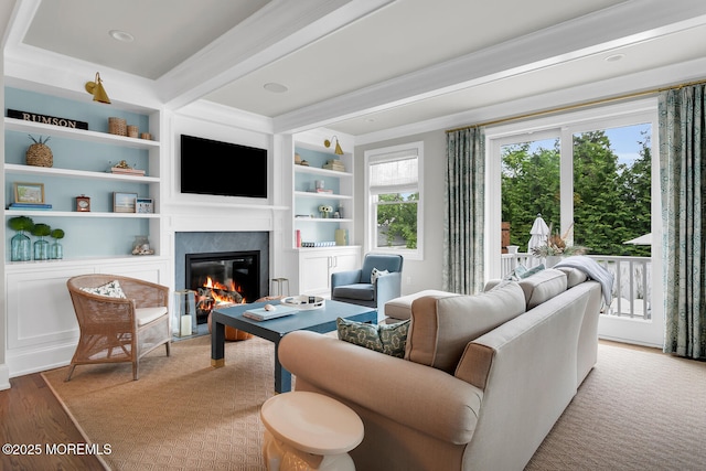 29 Allen St, Rumson, NJ 07760 - living room with a premium fireplace, wood finished floors, built in shelves, and beamed ceiling