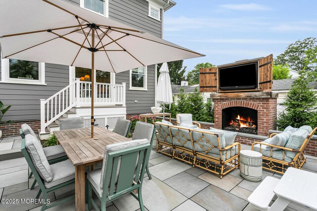 29 Allen St, Rumson, NJ 07760 - view of patio with outdoor dining space and an outdoor living space with a fireplace