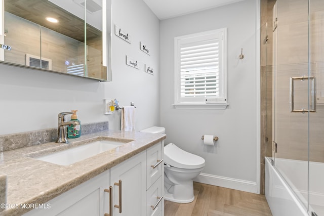 623 Forecastle Ave, Beachwood, NJ 08722 - bathroom featuring vanity and shower / bath combination with glass door