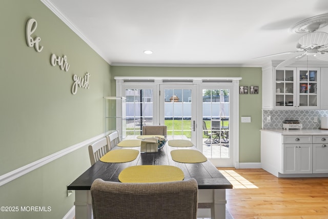 623 Forecastle Ave, Beachwood, NJ 08722 - dining area featuring ornamental molding, light wood-style flooring, ceiling fan, french doors, and recessed lighting