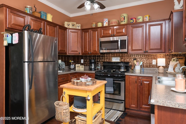 201 Riviera Dr, Toms River, NJ 08753 - kitchen featuring appliances with stainless steel finishes, ornamental molding, ceiling fan, backsplash, and light countertops