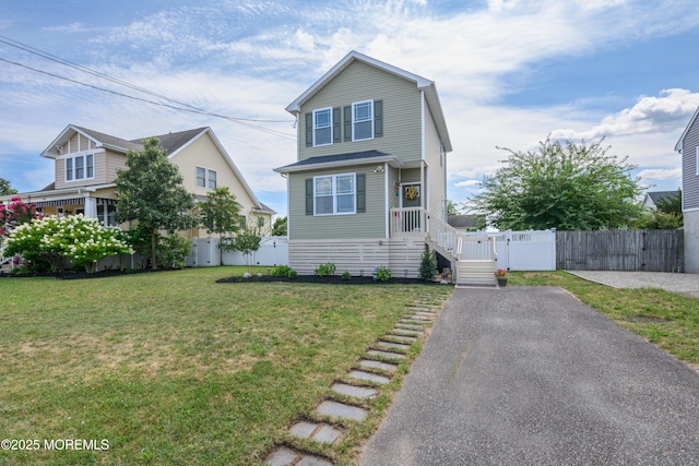 201 Riviera Dr, Toms River, NJ 08753 - traditional-style house with a gate and asphalt driveway