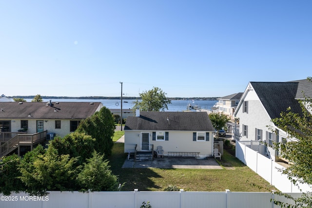 201 Riviera Dr, Toms River, NJ 08753 - exterior space featuring a fenced backyard, entry steps, and nearby suburban area