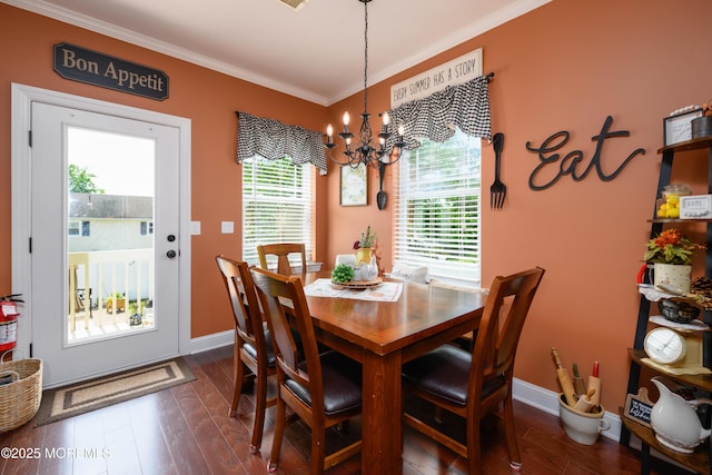 201 Riviera Dr, Toms River, NJ 08753 - dining space featuring a chandelier, ornamental molding, and dark wood-style floors
