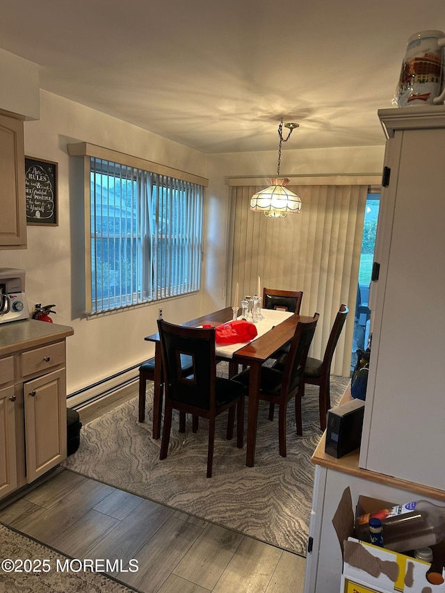 29 Keats Rd, Brick, NJ 08723 - dining area with light wood-style flooring and a baseboard radiator