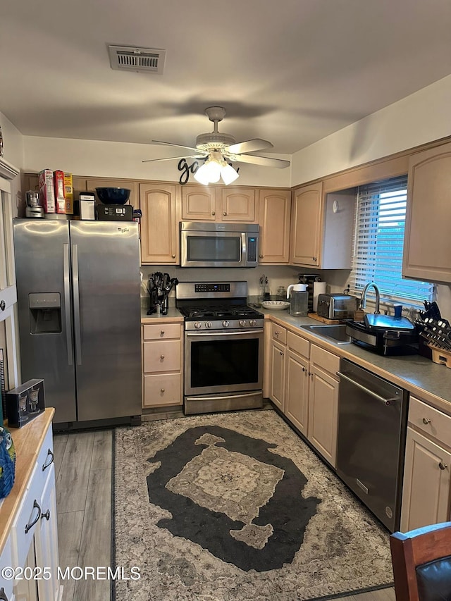 29 Keats Rd, Brick, NJ 08723 - kitchen featuring stainless steel appliances, ceiling fan, light wood finished floors, and light brown cabinets