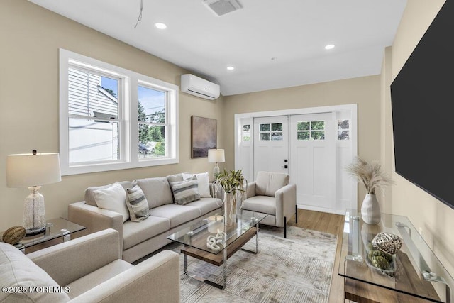208 Chatham Ln, Point Pleasant, NJ 08742 - living area with a wall unit AC, plenty of natural light, recessed lighting, and light wood-type flooring