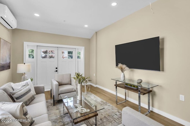 208 Chatham Ln, Point Pleasant, NJ 08742 - living room featuring a wall mounted air conditioner, wood finished floors, and recessed lighting
