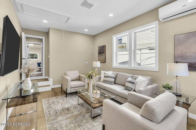 208 Chatham Ln, Point Pleasant, NJ 08742 - living area featuring attic access, an AC wall unit, wood finished floors, healthy amount of natural light, and recessed lighting