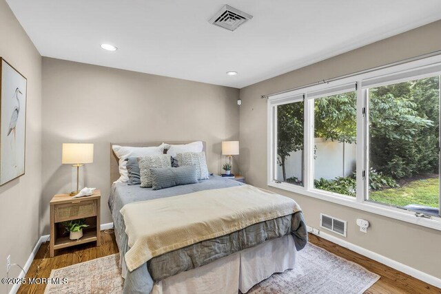 208 Chatham Ln, Point Pleasant, NJ 08742 - bedroom with wood finished floors and recessed lighting