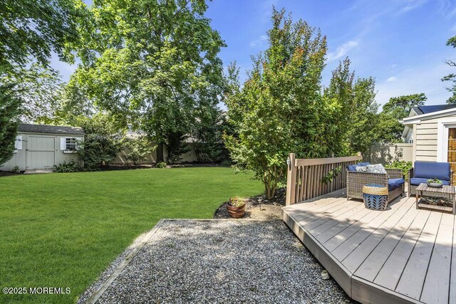 208 Chatham Ln, Point Pleasant, NJ 08742 - fenced backyard with a deck and a shed
