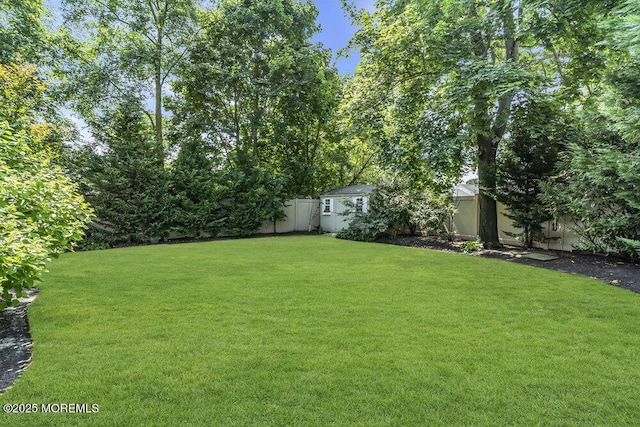 208 Chatham Ln, Point Pleasant, NJ 08742 - view of yard featuring a storage unit