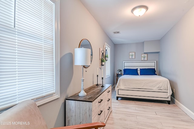 241 Hancock Ave, Seaside Heights, NJ 08751 - bedroom featuring light wood-type flooring and baseboards