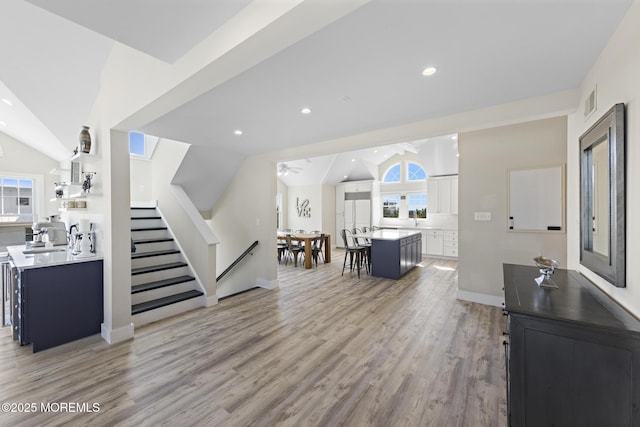 41A Long Beach Blvd, Long Beach Twp, NJ 08008 - living area featuring stairway, light wood-style floors, vaulted ceiling, and recessed lighting