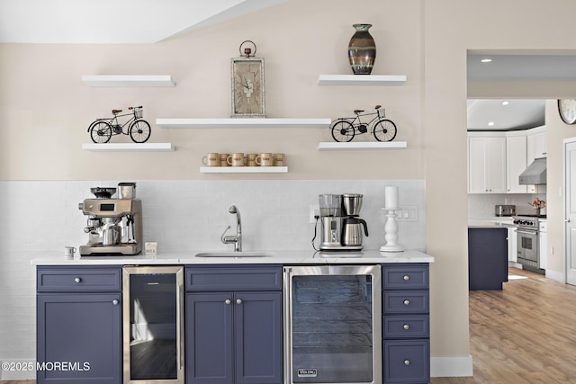 41A Long Beach Blvd, Long Beach Twp, NJ 08008 - indoor wet bar with beverage cooler, high end range, under cabinet range hood, backsplash, and recessed lighting