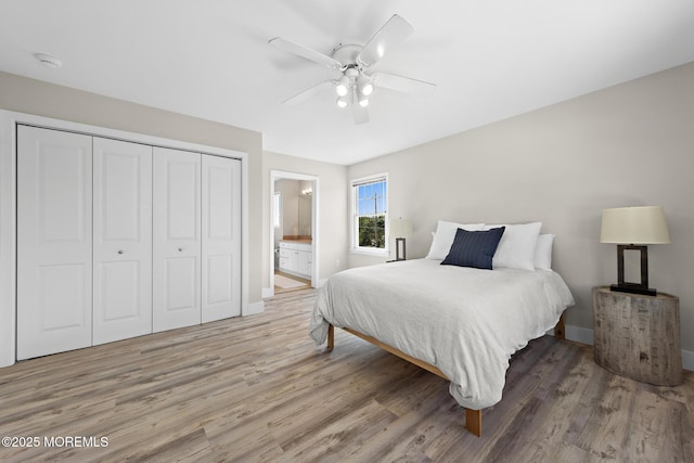 41A Long Beach Blvd, Long Beach Twp, NJ 08008 - bedroom featuring light wood-style flooring, a closet, ensuite bathroom, and a ceiling fan