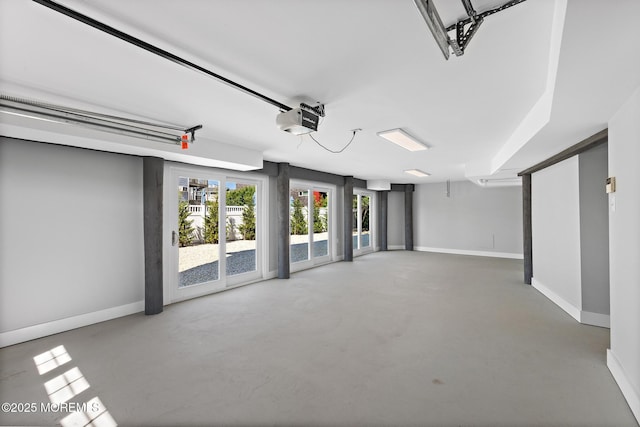 41A Long Beach Blvd, Long Beach Twp, NJ 08008 - garage featuring a garage door opener and baseboards