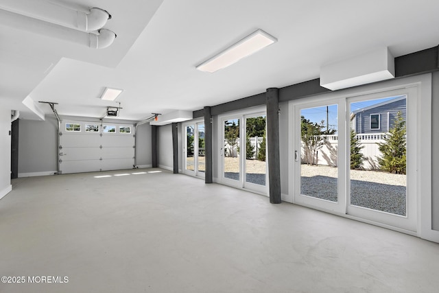 41A Long Beach Blvd, Long Beach Twp, NJ 08008 - garage featuring a garage door opener and baseboards
