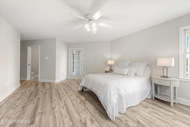 41A Long Beach Blvd, Long Beach Twp, NJ 08008 - bedroom with light wood finished floors, ceiling fan, and ensuite bathroom