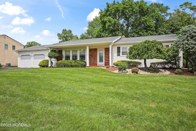 6 Pamela St, Marlboro, NJ 07746 - ranch-style house featuring a garage, a front yard, asphalt driveway, and brick siding