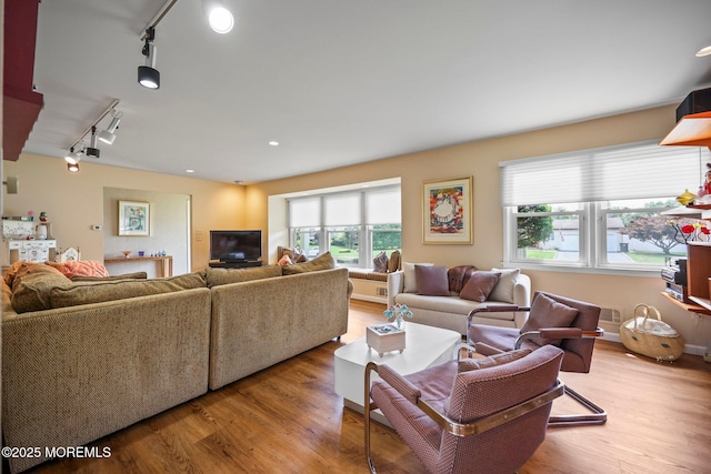 6 Pamela St, Marlboro, NJ 07746 - living area with track lighting and wood finished floors