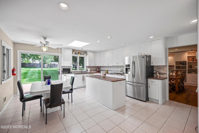 6 Pamela St, Marlboro, NJ 07746 - kitchen with appliances with stainless steel finishes, tasteful backsplash, a ceiling fan, a kitchen island, and recessed lighting