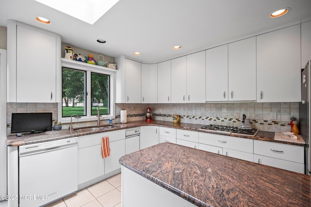 6 Pamela St, Marlboro, NJ 07746 - kitchen with dishwasher, stainless steel gas cooktop, dark stone countertops, white cabinets, and recessed lighting