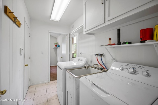 6 Pamela St, Marlboro, NJ 07746 - laundry area featuring cabinet space, washer and clothes dryer, and light tile patterned floors