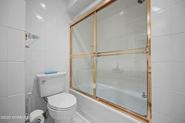 6 Pamela St, Marlboro, NJ 07746 - bathroom with tile walls and shower / bath combination with glass door
