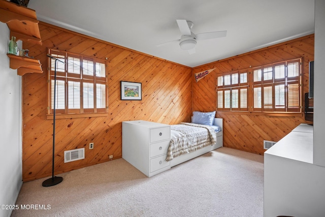 6 Pamela St, Marlboro, NJ 07746 - bedroom featuring wood walls, carpet floors, and ceiling fan