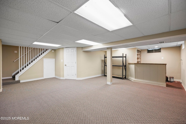 6 Pamela St, Marlboro, NJ 07746 - finished below grade area with stairs, a paneled ceiling, bar area, and carpet floors
