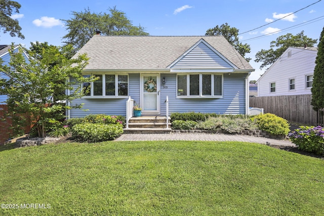 505 Moore Rd, Neptune Township, NJ 07753 - view of front of house featuring a shingled roof and a chimney