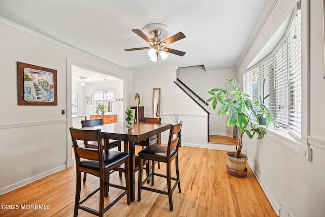 505 Moore Rd, Neptune Township, NJ 07753 - dining space featuring ceiling fan, light wood-style floors, and crown molding