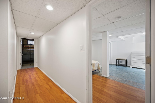 505 Moore Rd, Neptune Township, NJ 07753 - hallway featuring a drop ceiling, light wood-style flooring, and recessed lighting