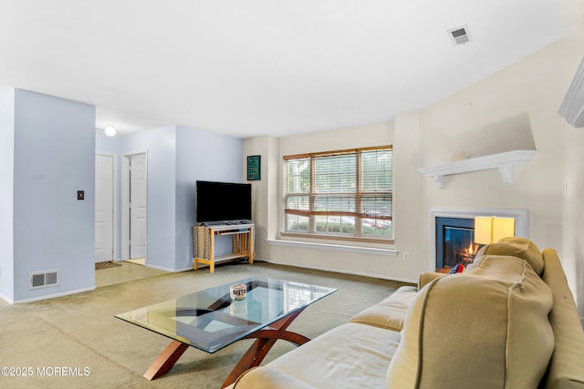 117 Lexington Ct, Holmdel, NJ 07733 - living area featuring carpet flooring and a glass covered fireplace