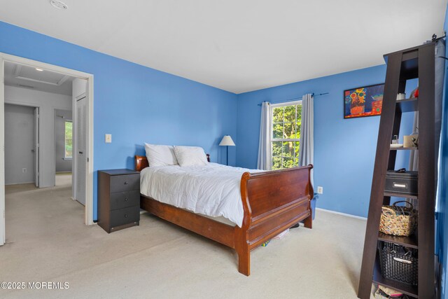 117 Lexington Ct, Holmdel, NJ 07733 - bedroom with light carpet and attic access