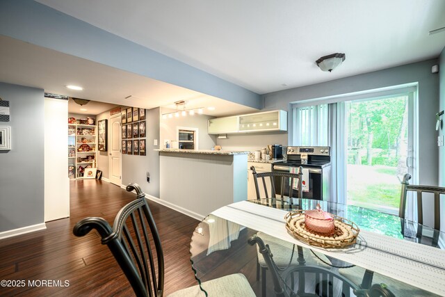235 Leesville Rd, Jackson, NJ 08527 - dining area with dark wood-style flooring and baseboards