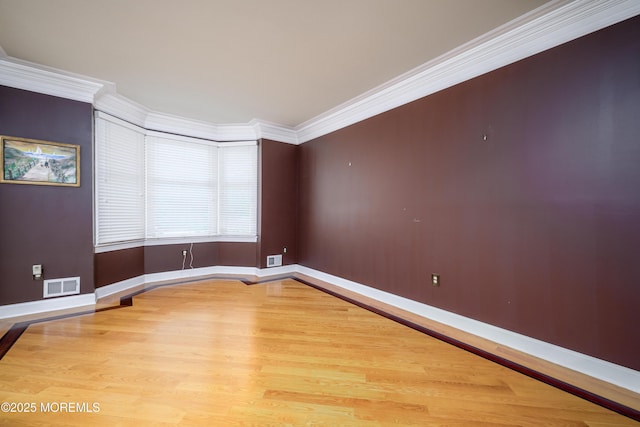 235 Leesville Rd, Jackson, NJ 08527 - spare room featuring wood finished floors and crown molding