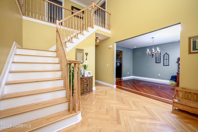 235 Leesville Rd, Jackson, NJ 08527 - staircase featuring a chandelier and a towering ceiling