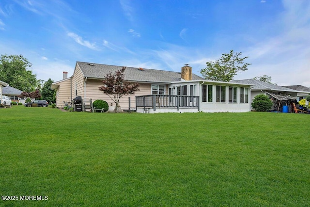 119 Barbados Dr S, Toms River, NJ 08757 - rear view of property featuring a chimney, a sunroom, and a lawn