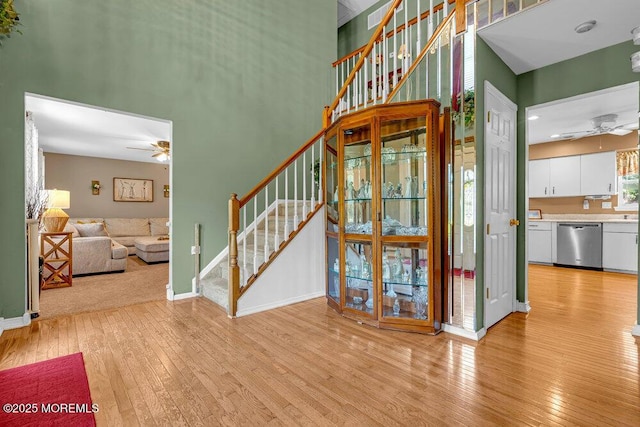 7 Crest Rd, Jackson, NJ 08527 - entryway featuring a ceiling fan, light wood-style floors, stairway, and a towering ceiling
