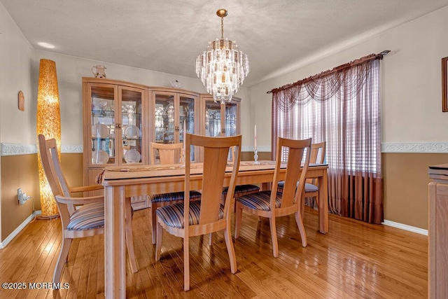 7 Crest Rd, Jackson, NJ 08527 - dining room with light wood-style flooring and a chandelier