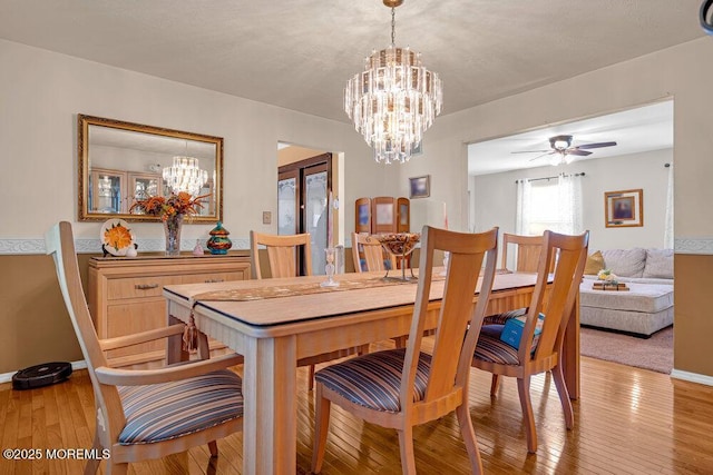 7 Crest Rd, Jackson, NJ 08527 - dining space with a chandelier, light wood-style floors, and ceiling fan