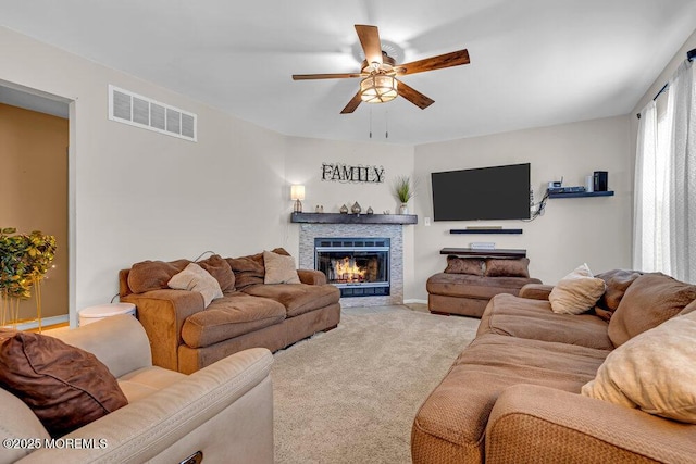 7 Crest Rd, Jackson, NJ 08527 - living area with a ceiling fan, light colored carpet, and a fireplace