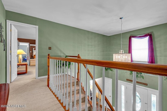 7 Crest Rd, Jackson, NJ 08527 - hallway with an upstairs landing, a chandelier, and carpet