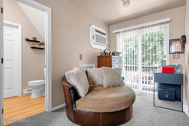 7 Crest Rd, Jackson, NJ 08527 - living area featuring baseboard heating, a wall unit AC, and carpet