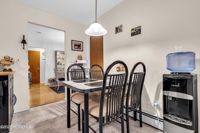 7 Beaverbrook Dr, Toms River, NJ 08757 - dining area featuring a baseboard heating unit and lofted ceiling
