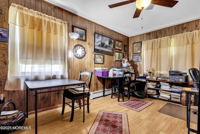7 Beaverbrook Dr, Toms River, NJ 08757 - office area featuring a ceiling fan, wood walls, a baseboard heating unit, and light wood finished floors
