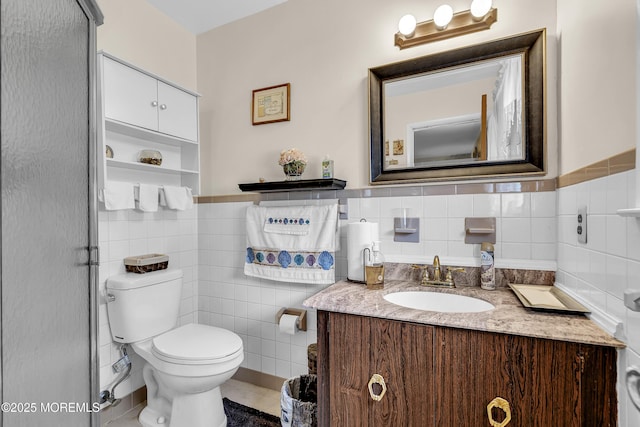 7 Beaverbrook Dr, Toms River, NJ 08757 - bathroom with tile walls, vanity, tile patterned floors, and wainscoting