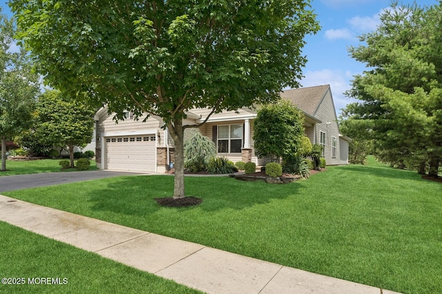 6 Day Star Rd, Manalapan, NJ 07726 - view of property hidden behind natural elements with an attached garage, asphalt driveway, and a front lawn